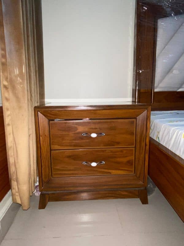 wooden Bed with 2 side table and a Dressing table 4