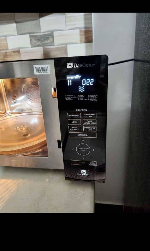 Dawlance micro oven 25 litre model number 560 use only 2 months 3