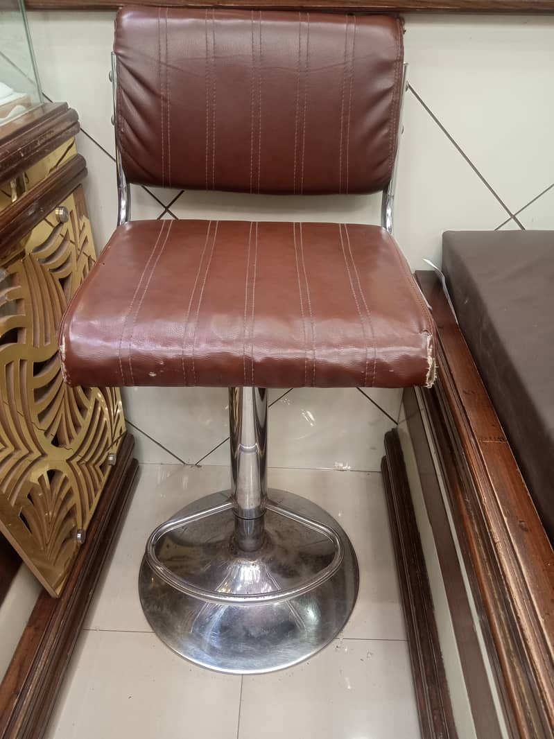 These are two swing chairs in used as a jewelers shop good condi 1