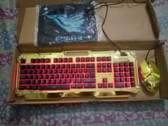 Branded gaming keyboard mouse combo in gold color