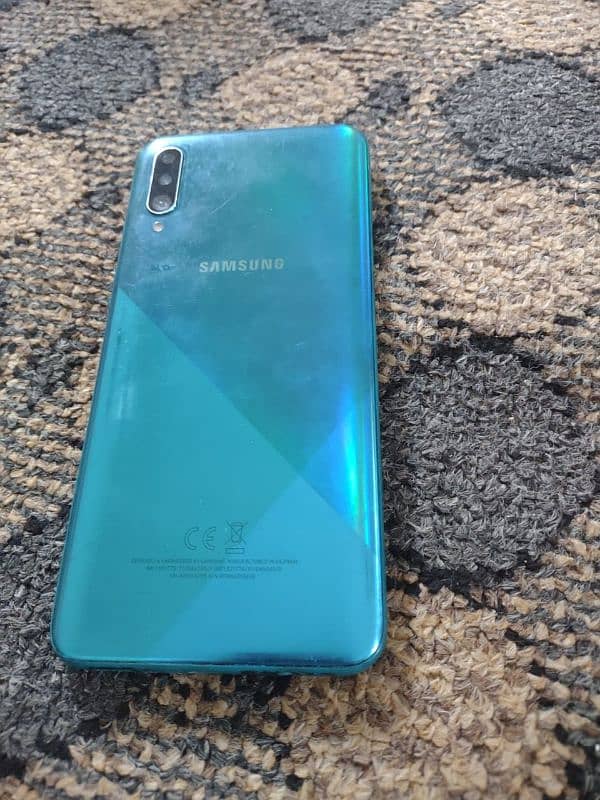 Samsung A30s  4gb . . 128gb  Thora sa shade hy screen ma Working 100% 7