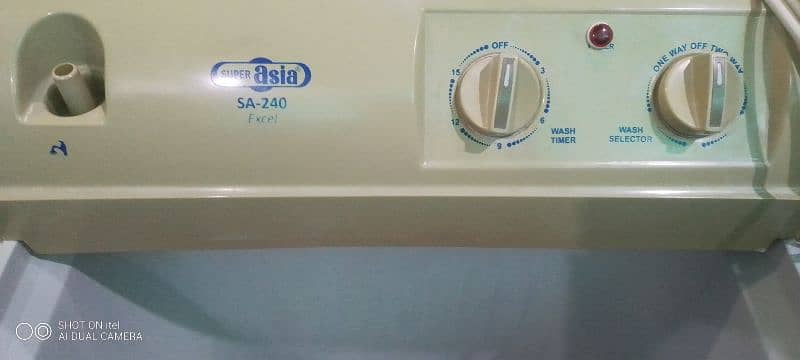 Oragnal Supar Asia washing machine and Oragnal Dawlance dryer. 2