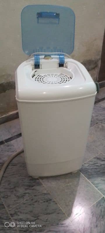 Oragnal Supar Asia washing machine and Oragnal Dawlance dryer. 5