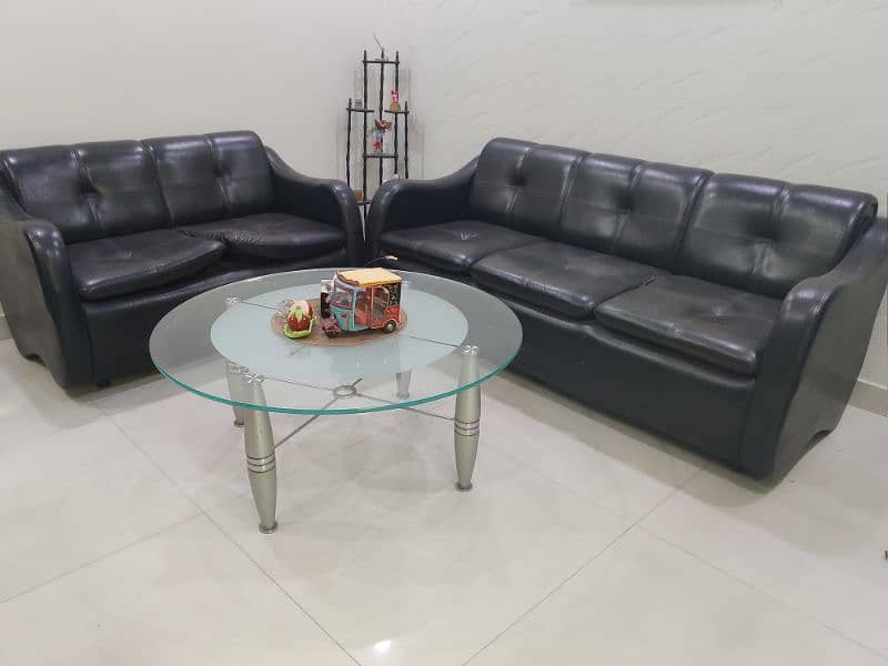 5 seater sofa with one glass top center table 0