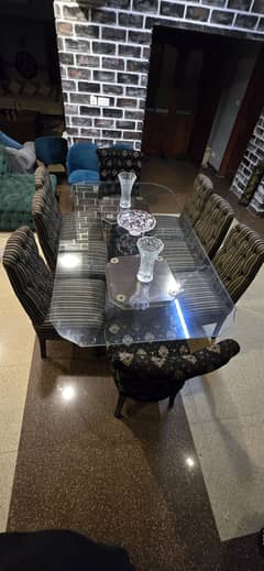 7'×4' foot glass top dining table with 8 poshished chairs