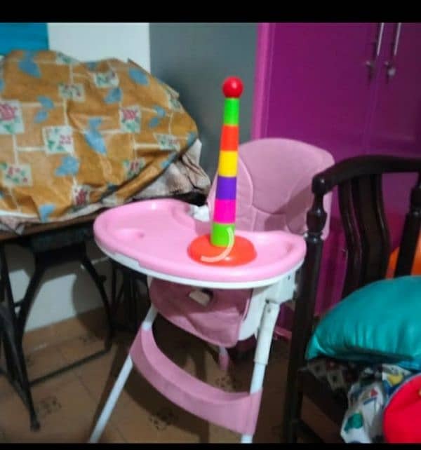 pink high chair 0