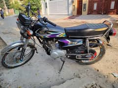 one hand use Honda 125 black color for sale good condition