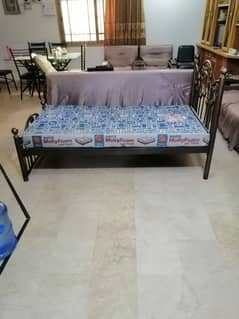 Iron bed with mattress