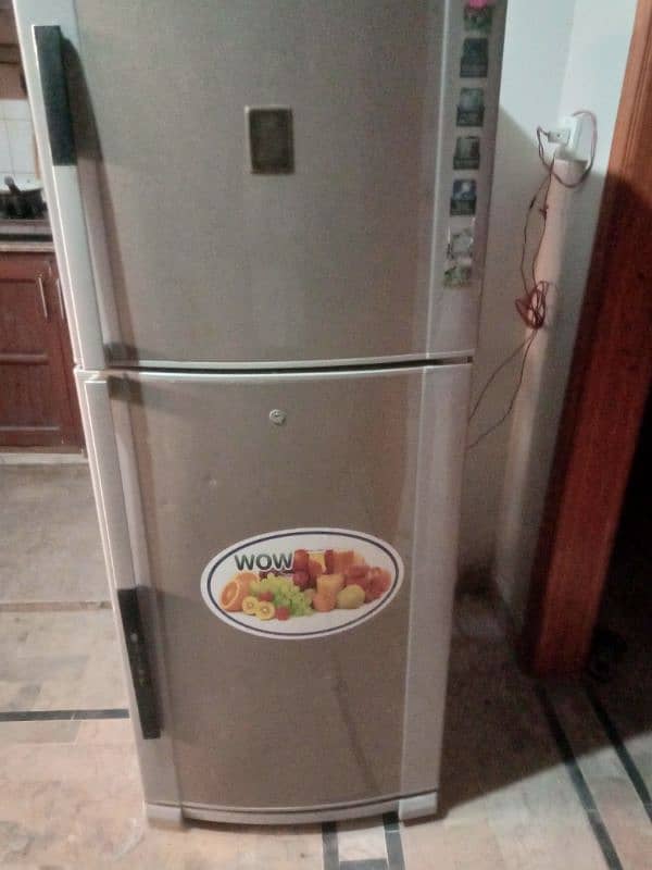 dawlance fridge slightly used good condition 0