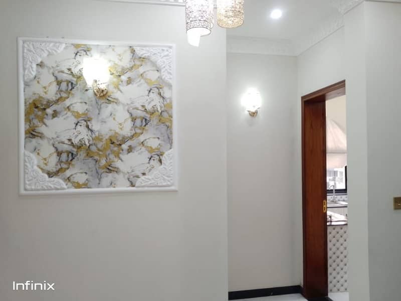 10 MARLA CORNE BRAND NEW LUXURY ELEGANT SPANISH DESIGN HOUSE AVAILABLE FOR SALE IN FORMANITES HOUSING SCHEME BLOCK -N LAHORE. 31