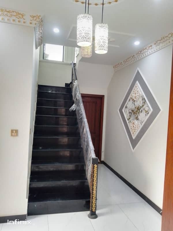 10 MARLA CORNE BRAND NEW LUXURY ELEGANT SPANISH DESIGN HOUSE AVAILABLE FOR SALE IN FORMANITES HOUSING SCHEME BLOCK -N LAHORE. 37