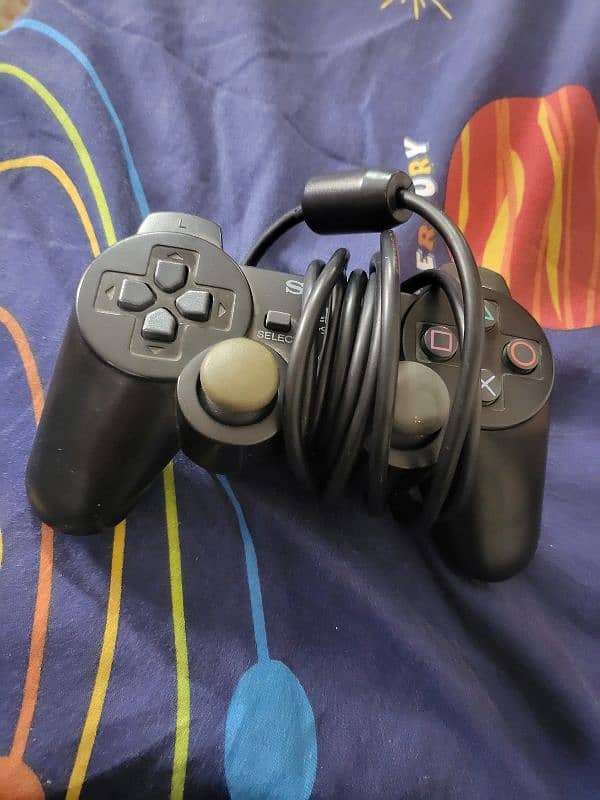 PS2 USED IN GOOD CONDITION 6