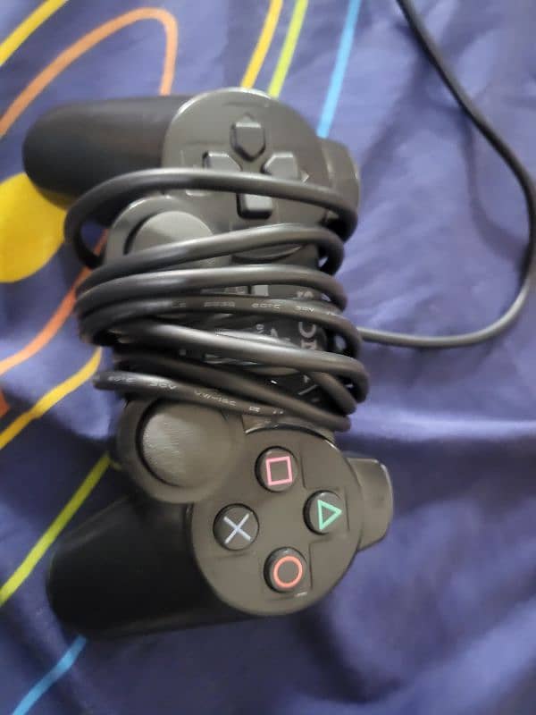 PS2 USED IN GOOD CONDITION 9