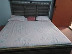 wooden double bed