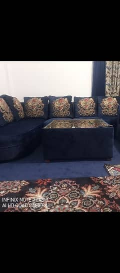 L shaped sofa along with *Dewan* ,*3 curtains*, *Table* & *Rug*