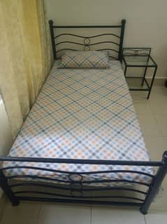 Wrought iron beds and Chairs