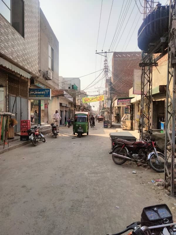 6.5 Marla commercial double story Hall for sale main Bazar sheraz Town near ameer Chowk college road Lahore 1