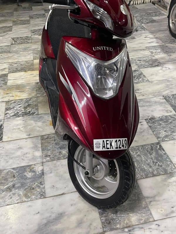 United 100 cc Scooty 7