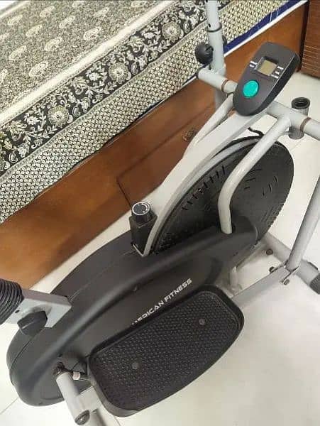 Exercising Elliptical Cycling Machine 1