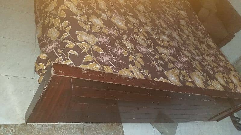 A wooden bed for sale 3