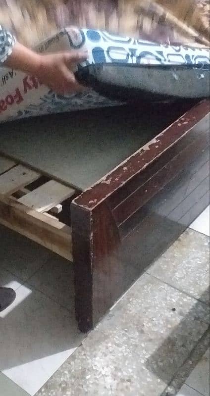 A wooden bed for sale 4