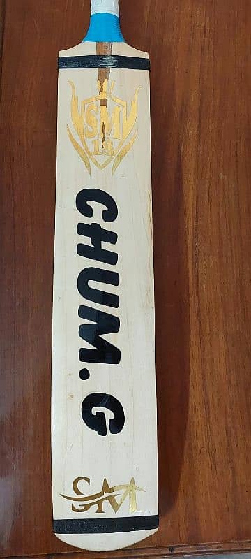 Tape ball cricket bat. 6