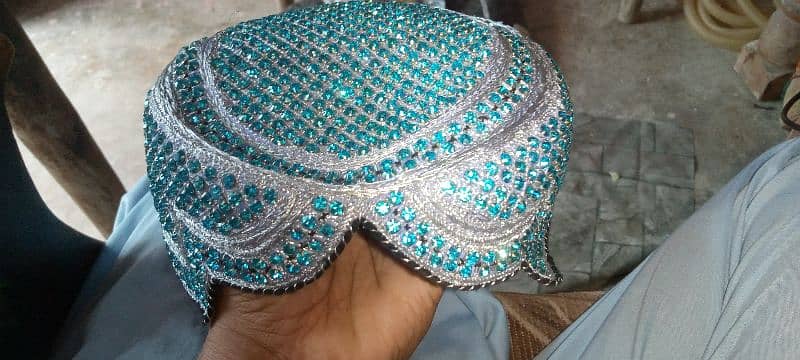 Sindhi topi haaath ki bani hui ha 0