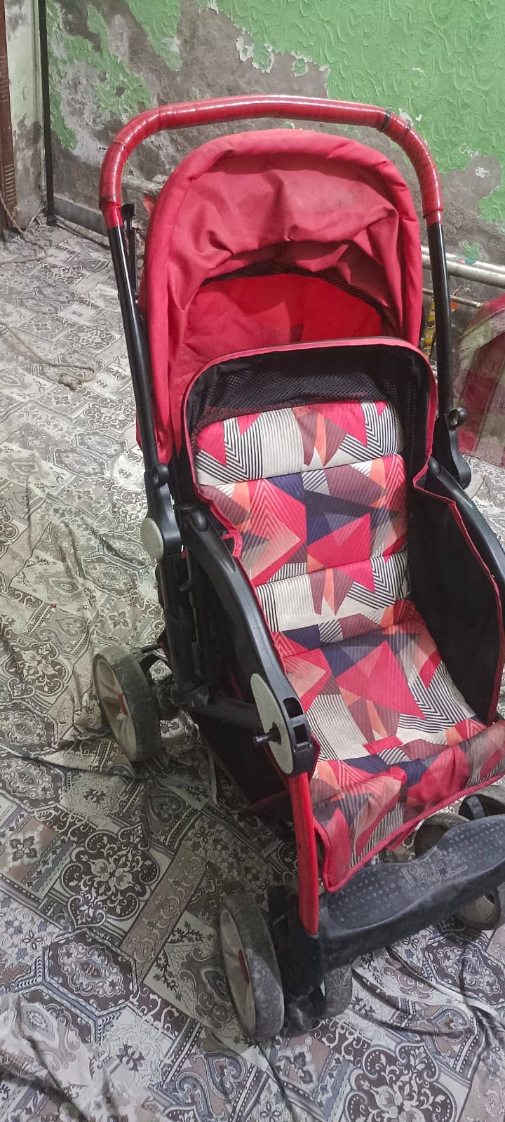 baby pram for kids in Red & black colour with best quality plastic 1