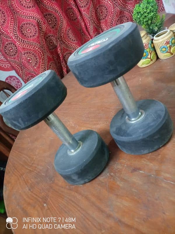 5 KG PAIR DUMBELLS. 1