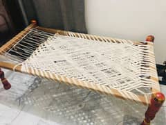 wooden cot