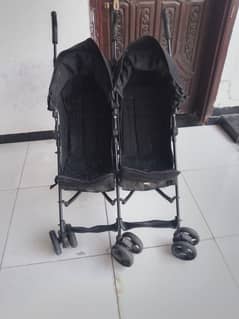 twin baby stroller urgent for sale