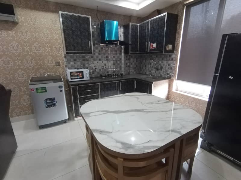 FOR RENT VERY REASONABLE PRICE 1 BED ROOM FUL FURNISHED APARTMENT SECTOR D BAHRIA TOWN LAHORE 10