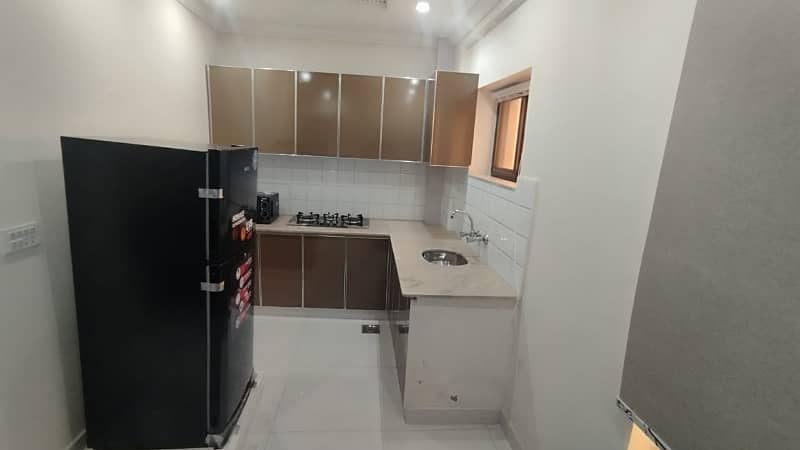 FOR RENT VERY REASONABLE PRICE 2 BED ROOM FULL FURNISHED APARTMENT IN SECTOR C BAHRIA TOWN LAHORE 4