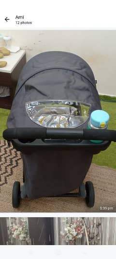 imported Joy brand stroller in neat clean and good working condition