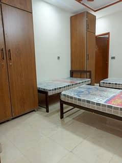 Running hostel building for rent setup for sale in Johar town opposite umt university hostels area profitable building 0