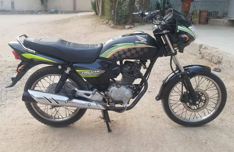 Honda Deluxe 125cc 6