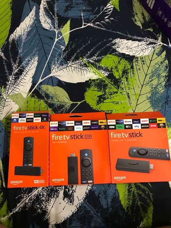 Fire TV Stick, Roku Ultra Streaming device 1