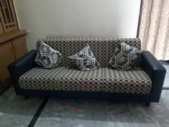 Seater sofa cum bed with matching center piece and cushions