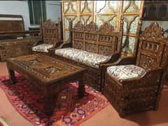 5 seater sofa available for sale. Swati hand carving.