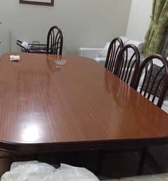 wooden dining table with 8 chairs 0