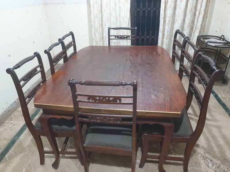 Used dinning table with 8 chairs 0