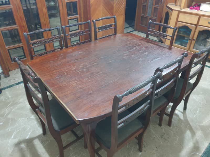 Used dinning table with 8 chairs 1