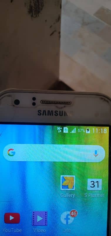 Samsung Galaxy J100 3