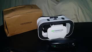 VR Shinecon Headset just like New with Bluetooth Remote for games