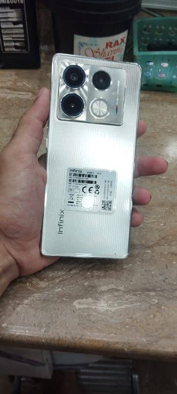 Infnix note 40 8/256. . . 7