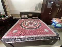 1 large bed , 2 side table/draws,1 mirror ,5 Almari ,1 devider