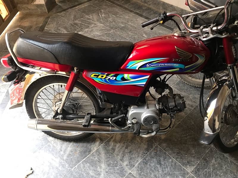 Honda CD 70 2024 3