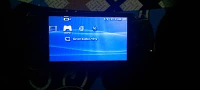 ORIGINAL PSP 2000 WITH ORIGINAL 16GB MEMORY CARD AND ORIGINAL CHARGER