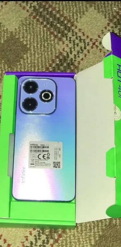 Infinix Hot 40i for sell . 6mnth warranty box charger all available hy 0