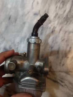 125carburetor original and sock 0